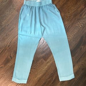Beach Riot coverup pant.  aqua blue gets lighter as it gets to bottom.